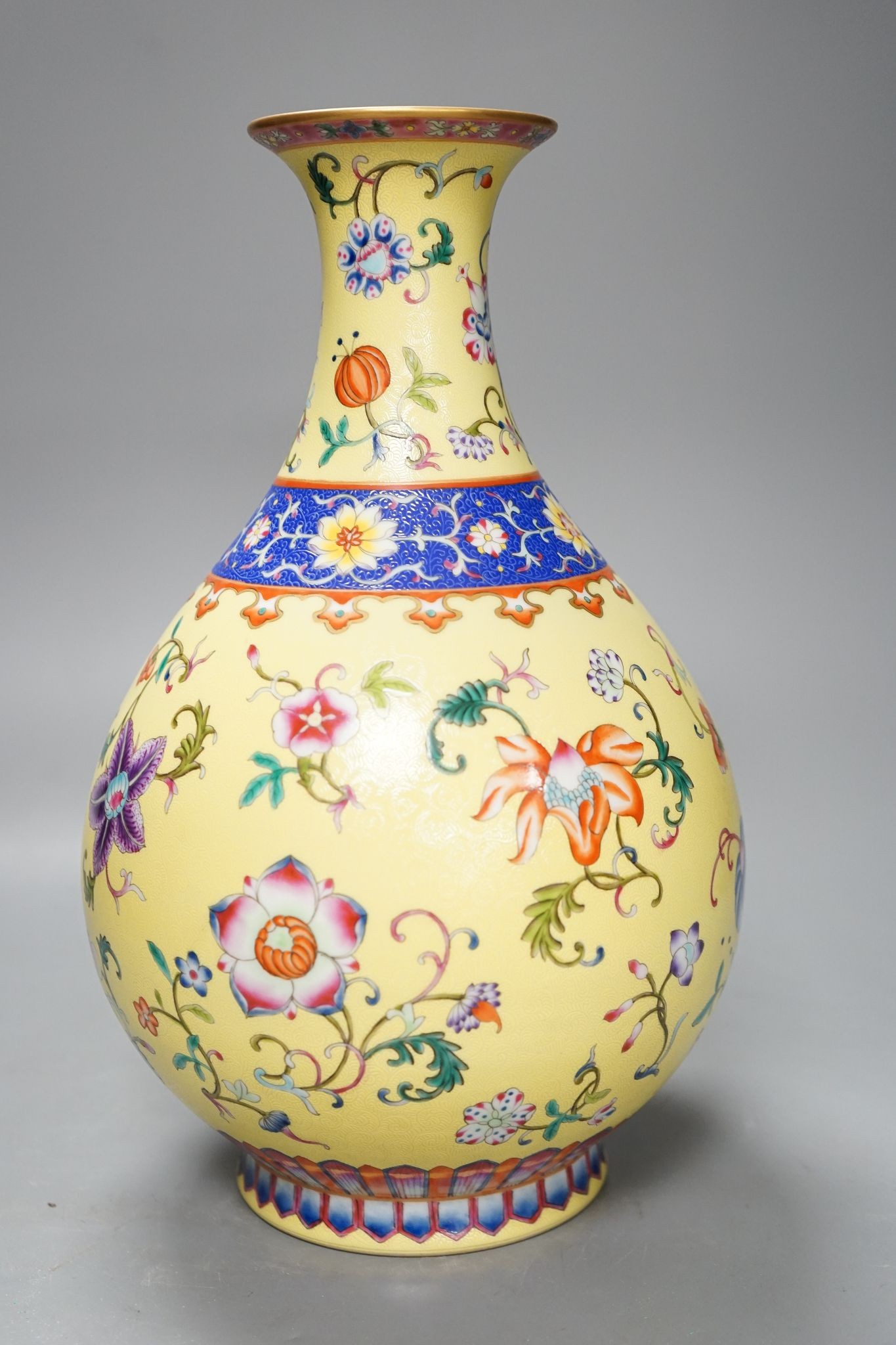 A Chinese yellow-ground porcelain pear-shaped vase, 34cm